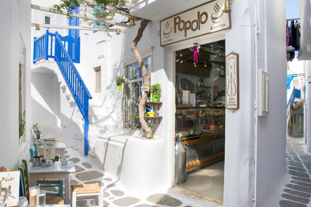 Entrance and outdoor seating area of Popolo restaurant.