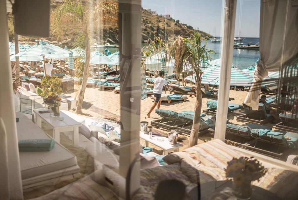 Is Mykonos expensive? a set of two sunbeds in the popular Nammos beach club at Psarrou beach, starts at 70 euros per day