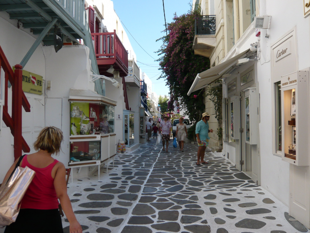 Walking at "Matogianni" in Mykonos town, the area with the beautiful white houses and the small, stone-paved roads painted in white.