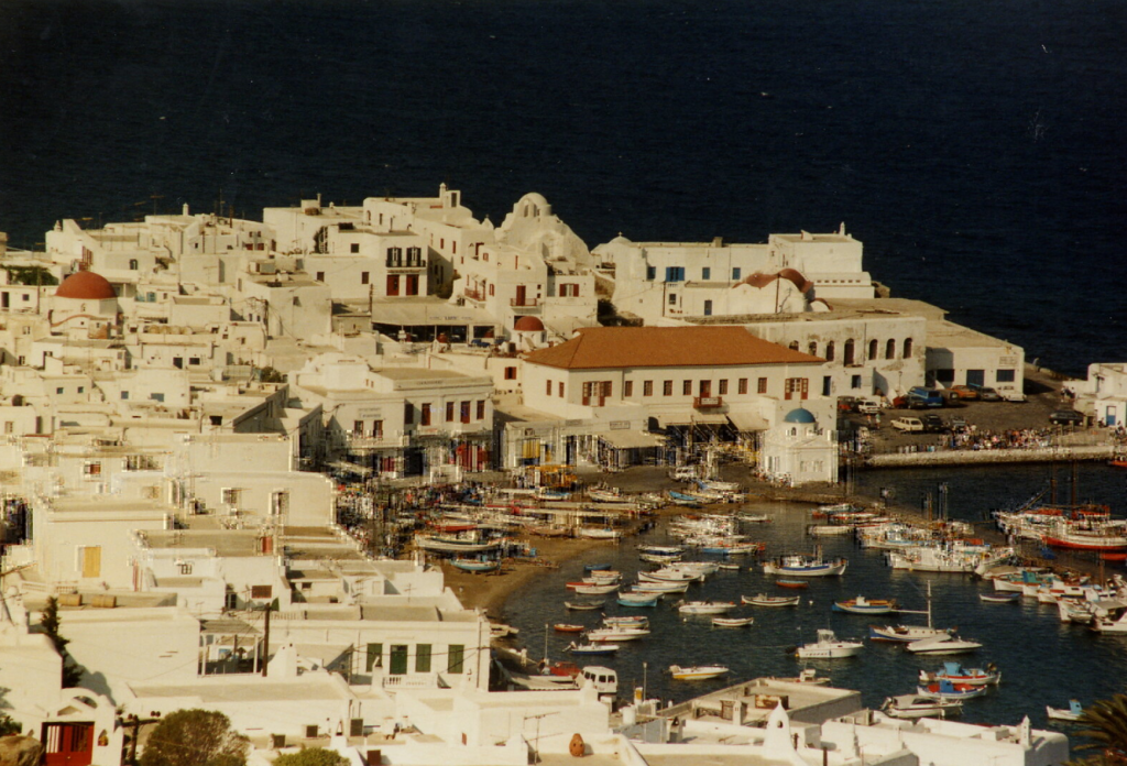 A panoramic view of Mykonos Town (Mykonos Chora), with the small harbor and the white houses.